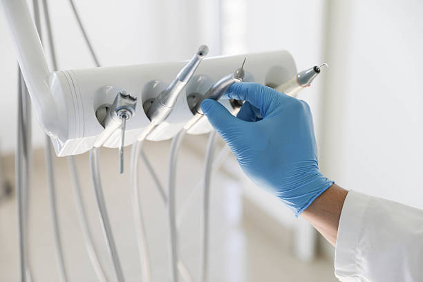 Professional Invisalign Clear Aligners technician working in Goodrich, MI